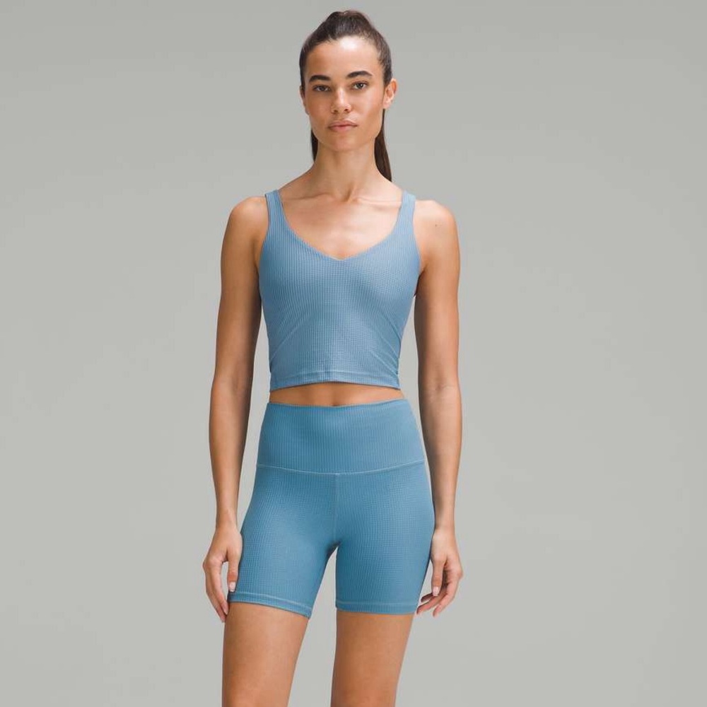 Blue lululemon biker short waffle texture.